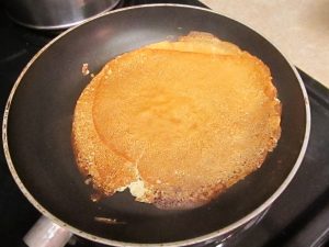 Cooking soy crepes for kids